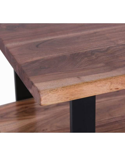 Close-up of the Live Edge Coffee Table, highlighting its rich acacia wood grain and smooth polished finish with darker swirls. A black metal leg is partially visible below, adding modern flair to its rustic charm.