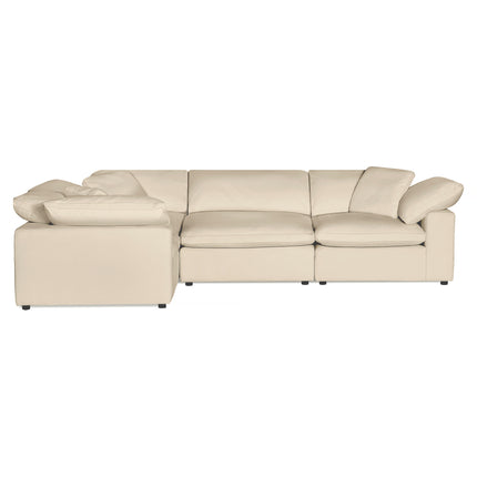 The Peyton 4 Piece Left L is a modern, cream-colored L-shaped sectional sofa featuring luxurious down and feather cushions. Positioned against a plain white background, its sleek lines and inviting look are highlighted.