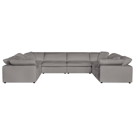 The Peyton 8 Piece Pit, a luxurious large gray U-shaped sectional sofa, features plush cushions and low armrests. It perfectly balances comfort with style, elegantly positioned against a plain white background.