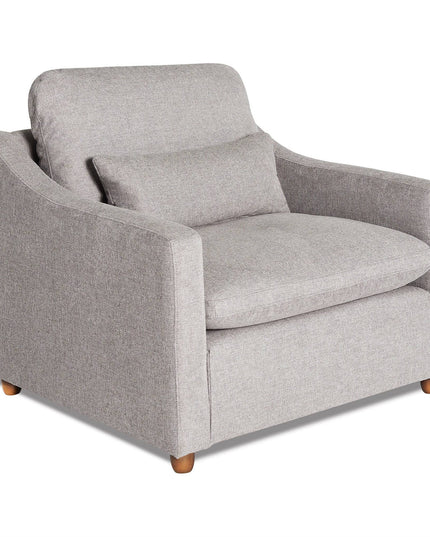 The My Cloud Slope Chair is a gray upholstered armchair with a rounded backrest, matching lumbar cushion, wooden legs, and a plush seat cushion, offering modern and customizable comfort and style.