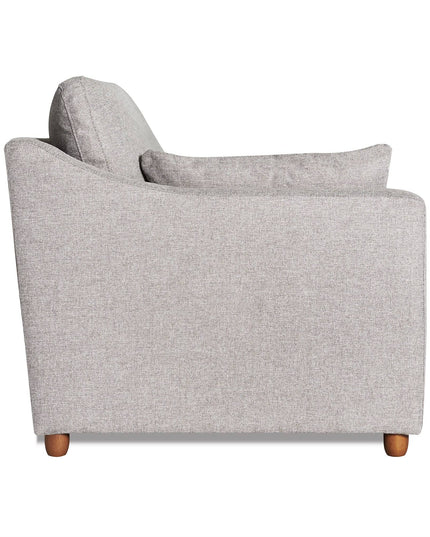 Side view of the My Cloud Slope Chair, a light gray sofa with wooden legs. The textured fabric complements its cushioned backrest and matching pillow, offering cloud-like coziness. Its modern, minimalist design enhances any living space elegantly.