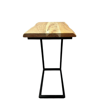 The Live Edge C-Table features a rectangular acacia wood top with a natural finish highlighting its grain patterns. Its minimalist geometric design is supported by a black metal frame, seamlessly blending style and functionality, all set against a white background.