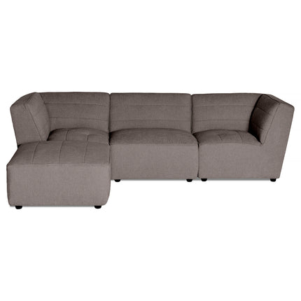 The Millenium 3 Piece + Ottoman offers luxurious comfort in a gray, L-shaped modular sectional. Its ultra-plush fabric is soft and features subtle stitched patterns on the cushions, inviting relaxation in a modern design.