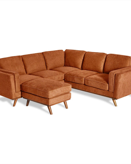 The Maddox Sectional is a mid-century modern brown fabric masterpiece with tapered wooden legs and plush cushions, featuring a left chaise with cushioned backrest and armrests against a crisp white background.