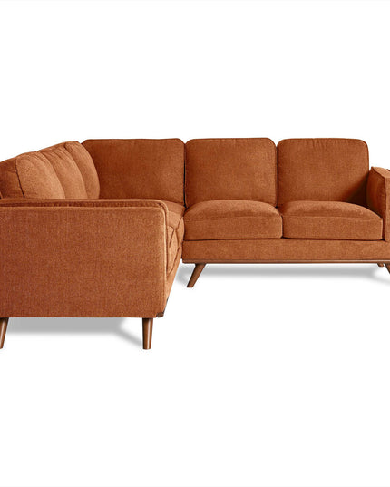 Introducing the Maddox Sectional: a modern burnt orange sofa with plush cushions, featuring three seats on one side and two on the other. Set on sleek wooden legs against a white background, it adds mid-century modern elegance to any space.