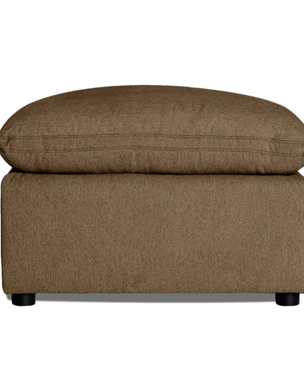 The My Cloud 30 Ottoman features a brown cushioned design and rectangular shape with soft fabric. This customizable piece has a plush top and is supported by four small, round black legs, bringing both style and comfort to your décor.