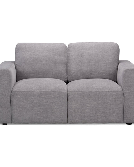 Explore the Lugano Loveseat, a modern, minimalist gray piece with wide armrests and a cushioned backrest. Its smooth, tailored fabric offers plush cushions that enhance its sleek comfort. Experience Italian luxury in its clean, contemporary design.