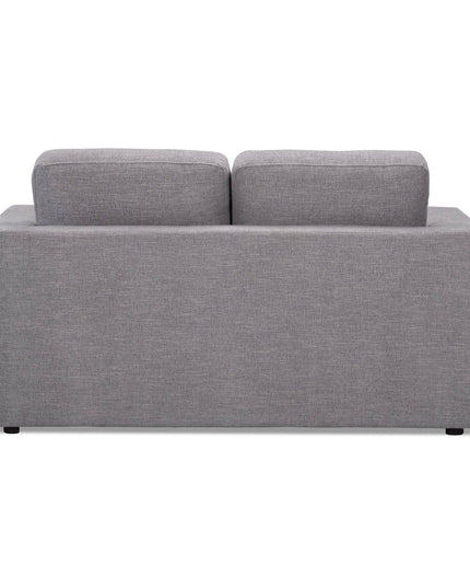 A gray Lugano Loveseat viewed from the back showcases plush cushions and clean lines. Its smooth fabric exudes Italian luxury with a minimalist design, perfectly complemented by small dark legs.