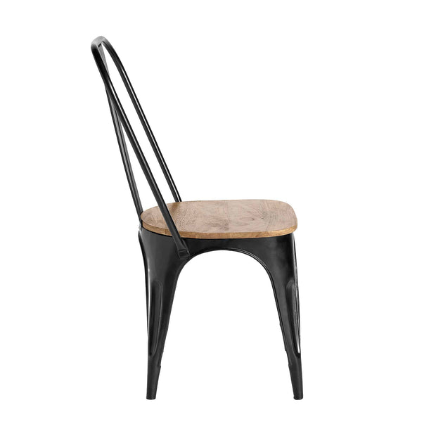 The Mango High Back Chair showcases a side view of its minimalist design, featuring a mango wood seat and black metal frame with a slender, curved backrest and sturdy legs, epitomizing sustainable handcrafted style.