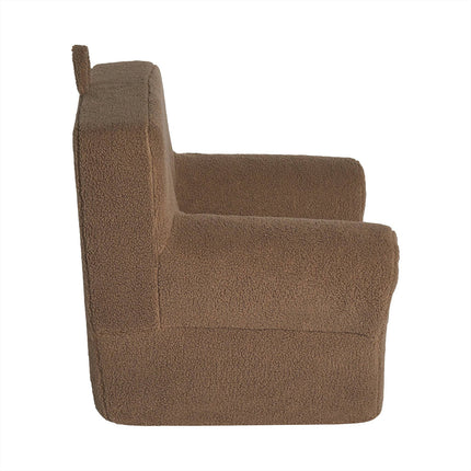 The side view of the plush My Cloud Kidz Chair showcases its brown, textured Sherpa fabric. Its boxy, classic design features straight lines and deep seating, making this customizable piece perfect for any space. The background is white.