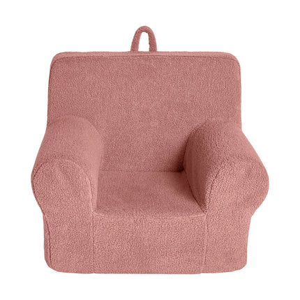 Discover the My Cloud Kidz Chair, a compact plush armchair in soft pink Sherpa fabric with rounded arms and a high backrest. It features a convenient top handle for easy portability and is shown on a plain white background, offering customizable furniture options.