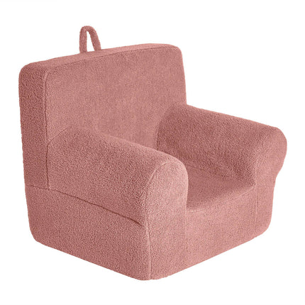 Introducing the My Cloud Kidz Chair: a plush pink armchair with a teddy bear-textured Sherpa fabric, square backrest, wide armrests, and a top fabric loop for easy carrying.