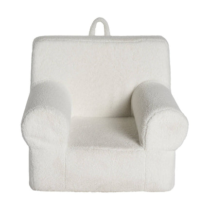 Discover the My Cloud Kidz Chair, a small white armchair crafted for kids. It boasts soft Sherpa fabric, rounded armrests, and a handy fabric loop for easy portability.