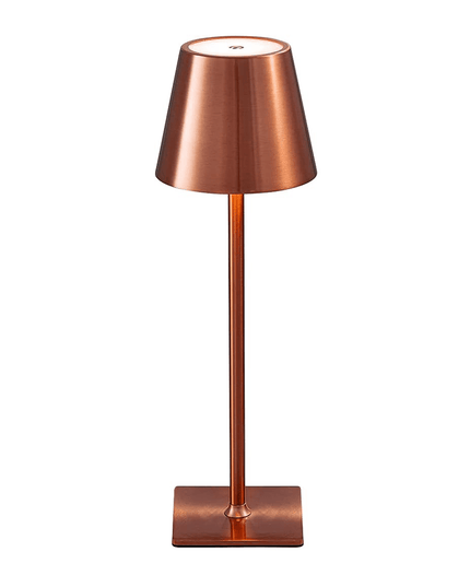 The Aura Lamp is a sleek, modern table lamp with a copper finish and a conical shade. It features a slender stand, square base, portable design, and USB charging for a minimalist and contemporary look.