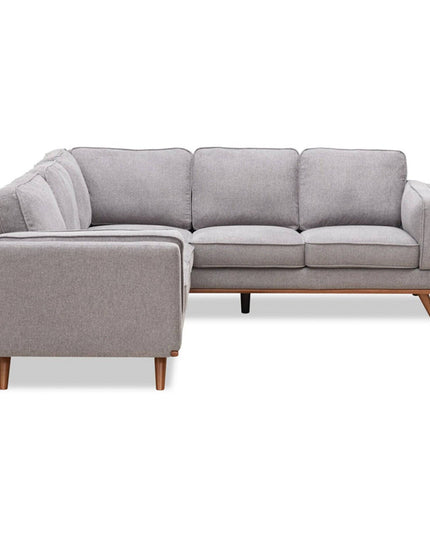 A light gray L-shaped sectional sofa with three seat cushions and a plush backrest, featuring wooden legs. Its modern design offers comfort, making it perfect for a contemporary living room. Includes free fabric swatches for customization.