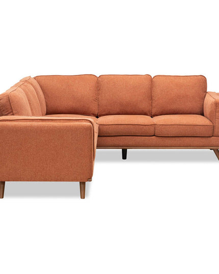 The Free Fabric Swatches offer a taste of mid-century modern style with options for an L-shaped sectional featuring clean lines, minimalist design, orange upholstery, wooden legs, plush back cushions, and firm seats. The swatches help you envision the sofas angled elegance in your space.