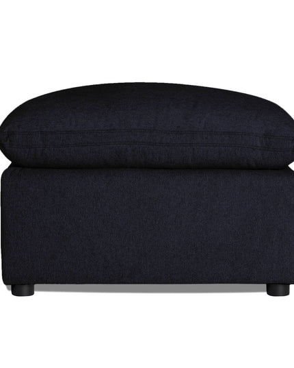 Set against a white backdrop, the My Cloud 30 Ottoman showcases a sleek black rectangular design with a cushioned top and small rounded legs, exemplifying customizable furniture that adapts effortlessly to any interior theme.